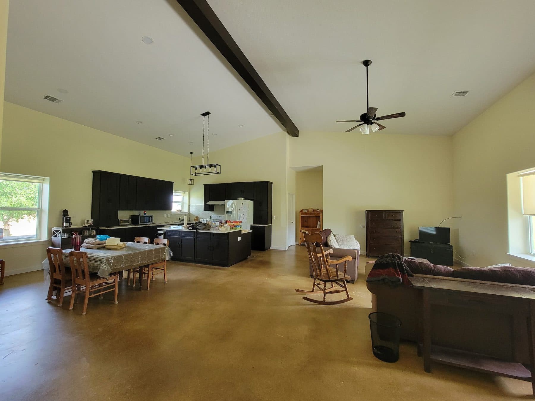 Freshly painted open plan living room and kitchen in a Greater Austin home
